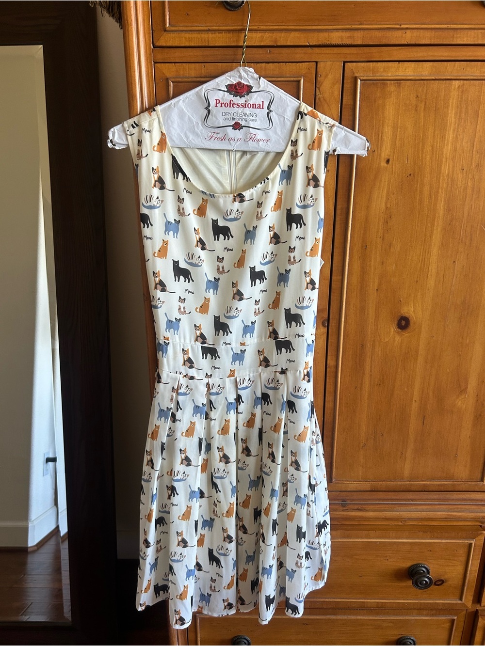 Cream Sleeveless Casual Dress with Playful Dog Print